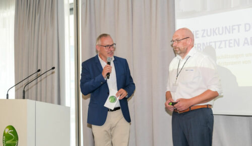 RSR-Geschäftsführer Thomas Piel (l.) und Marcus May (Compugroup Medical) auf der Fachtagung 2022. (Foto: RSR/Elbefoto Thomas Willkowei)